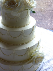 Swags and piping on buttercream wedding cake.
Pittsboro, NC