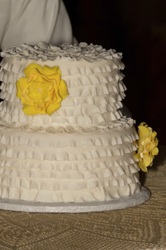 Fondant ruffles with a splash of yellow sugar flowers.
Fondant cake in Durham, NC.